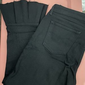 Black ruffled leg Levi Jeans